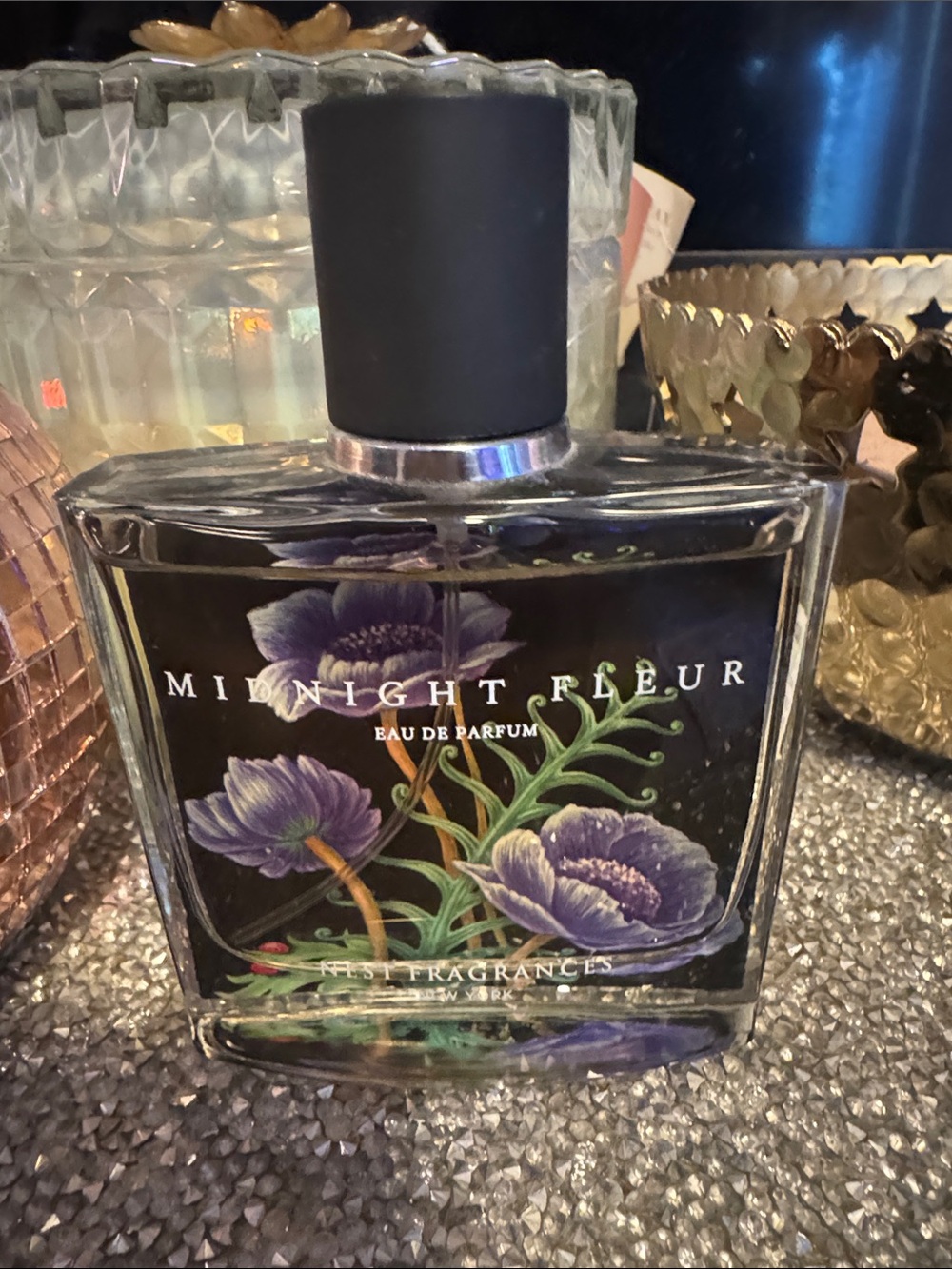 NEST Fragrances Black Bottle with Purple Floral Accent